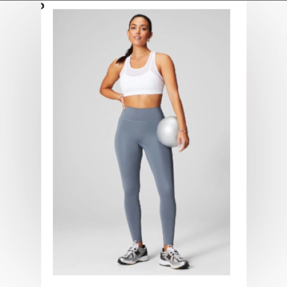 Fabletics Women High Waisted leggings Blue with side pockets Size Sm. NWT